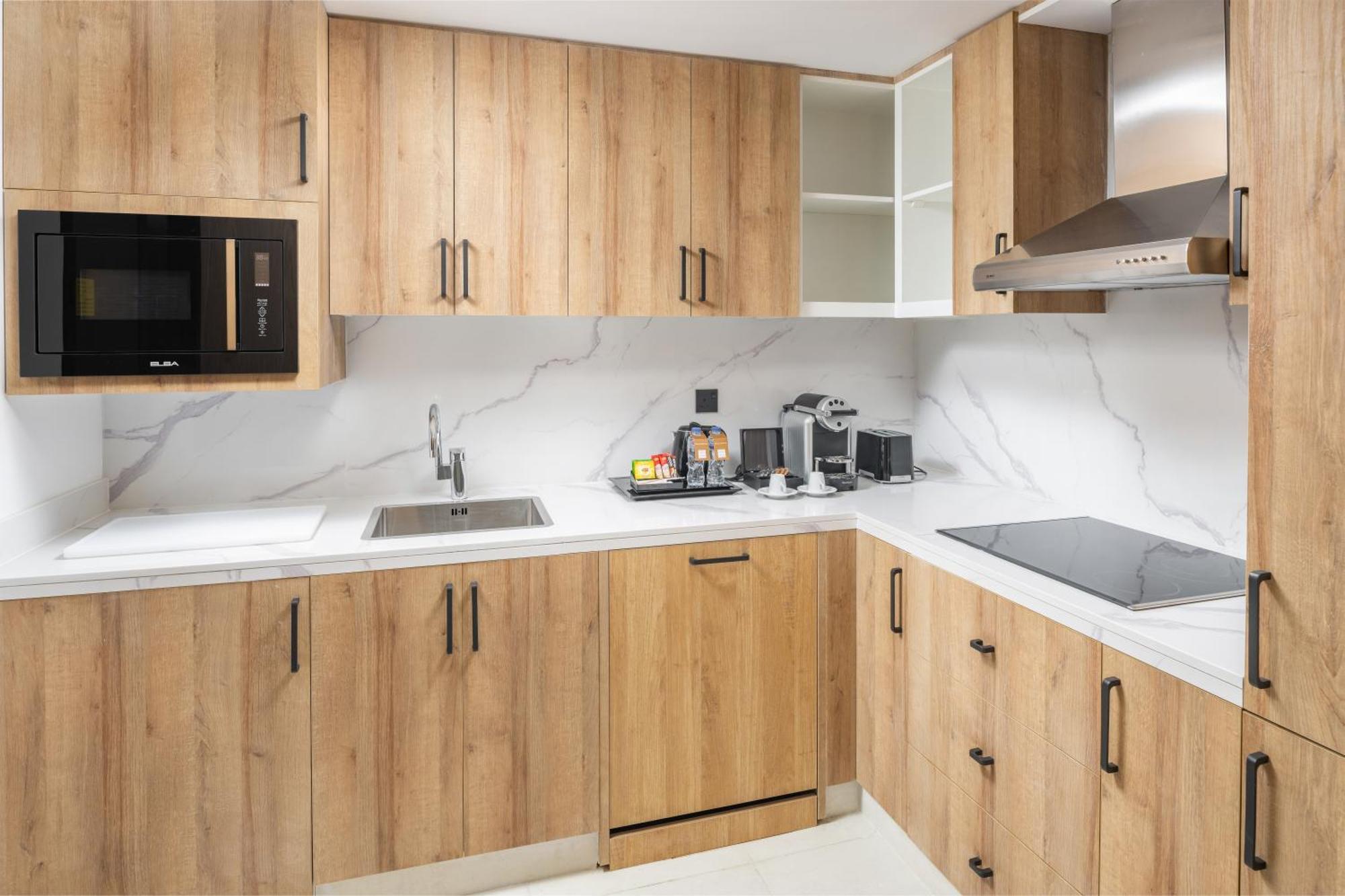 Taiba Suites Madinah Medina Exterior foto A modern kitchen