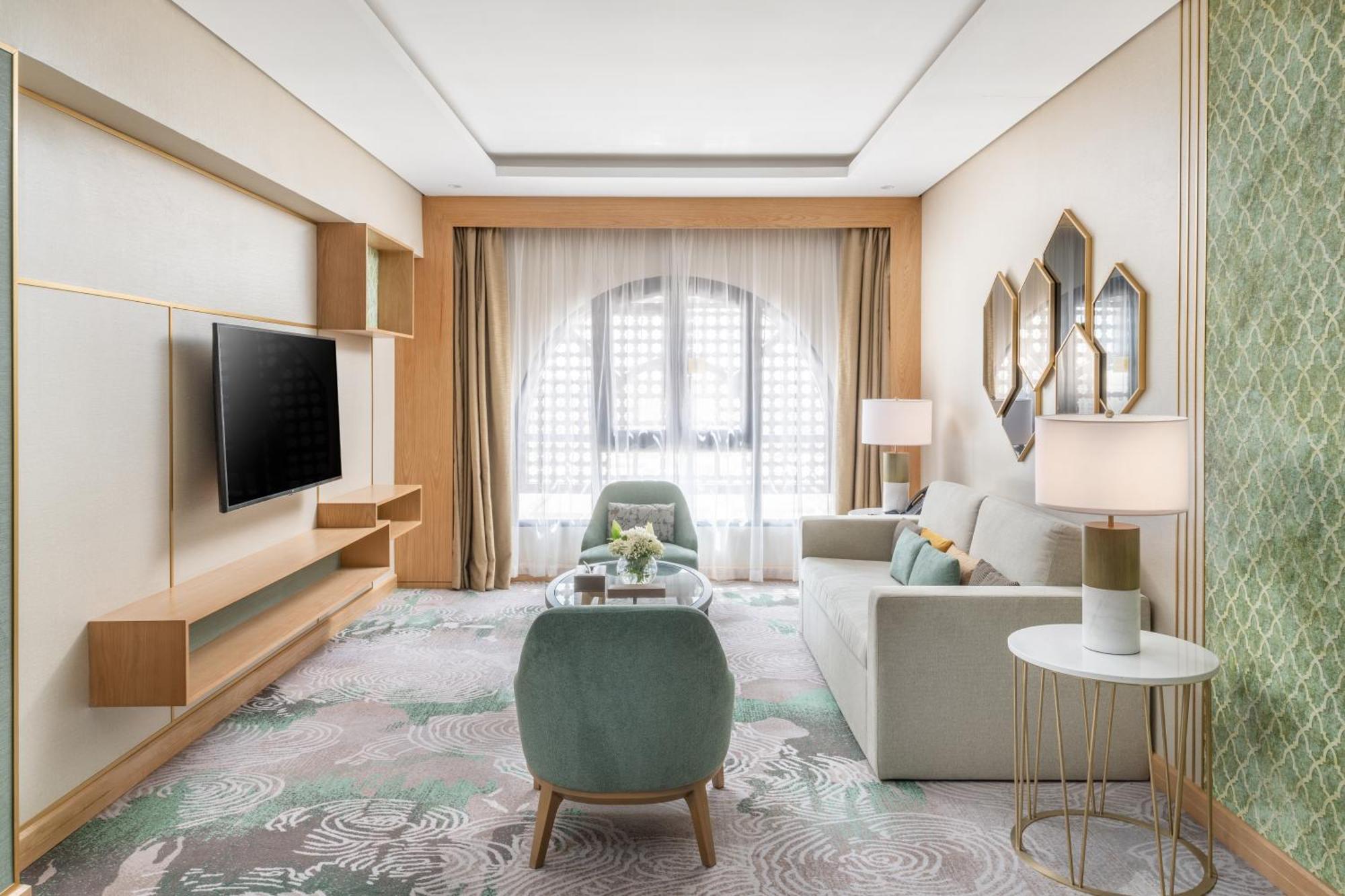 Taiba Suites Madinah Medina Exterior foto A living room at the hotel